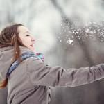 Young woman enjoying winter